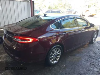 2017 Ford Fusion SE z VIN 3FA6P0HD2HR122650, wystawiony jako IAAI lot #41965411 z przebiegiem 107 227 mil mil oraz . Historia ofert i sprzedaży dostępna na DreamBid. Obrazek 4.