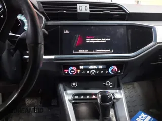 2023 Audi Q3 S line Premium z VIN WA1DECF3XP1112714, wystawiony jako IAAI lot #41918405 z przebiegiem 30 969 mil mil oraz . Historia ofert i sprzedaży dostępna na DreamBid. Obrazek 18.