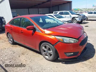 2018 Ford Focus SE z VIN 1FADP3F26JL321831, wystawiony jako IAAI lot #42085951 z przebiegiem 87 729 mil mil oraz . Historia ofert i sprzedaży dostępna na DreamBid. Obrazek 13.