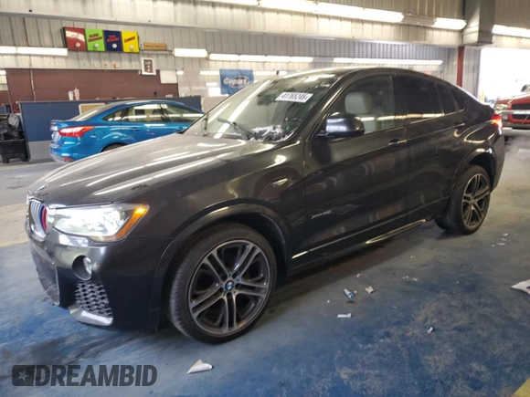 2015 BMW X4 xDrive35i with VIN 5UXXW5C51F0E88340, listed as a Copart auction lot 41765245 with 140,510 mi miles and Clean title. Bid and sale history available at DreamBid. Image 1.