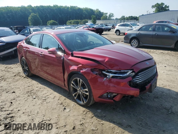 2017 Ford Fusion Titanium с VIN 3FA6P0D96HR208223, выставлен на аукционе Copart как лот 57019565 с пробегом 73 211 миль миль и Списание • Salvage title. История ставок и продаж доступна на DreamBid. Изображение 4.