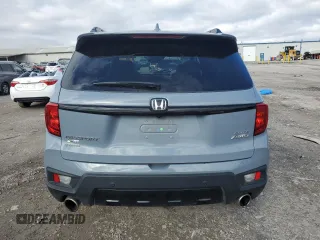 2023 Honda Passport Elite with VIN 5FNYF8H05PB013276, listed as a Copart auction lot 87323504 with 27,360 mi miles and Salvage Title. Bid and sale history available at carsss.com. Image 6.