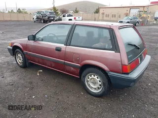 1987 Honda Civic z VIN JHMEC3427HS028239, wystawiony jako IAAI lot #41728725 z przebiegiem 113 710 mil mil oraz . Historia ofert i sprzedaży dostępna na DreamBid. Obrazek 3.