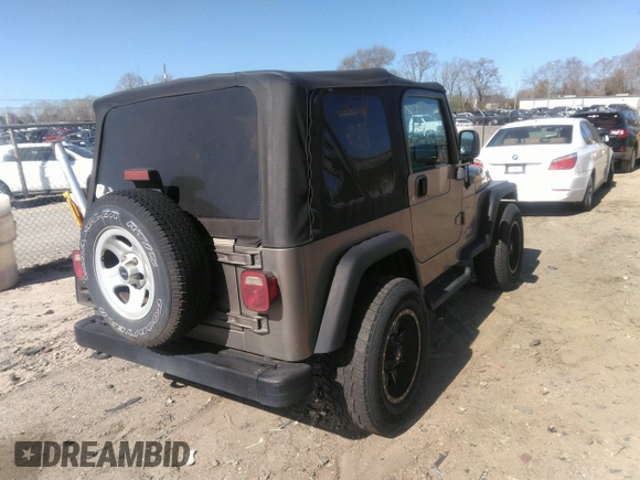 2003 Jeep Wrangler Sport with VIN 1J4FA49S53P365363, listed as a IAAI auction lot 41818320 with 154,567 mi miles. Bid and sale history available at carsss.com. Image 4.