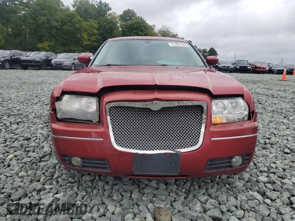 2009 Chrysler 300 Touring with VIN 2C3KA53V99H617274, listed as a Copart auction lot 71791144 with 123,045 mi miles and Salvage Title. Bid and sale history available at carsss.com. Image 5.