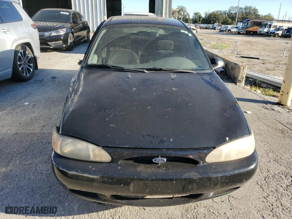 1999 Ford Escort LX with VIN 1FAFP10P5XW277376, listed as a Copart auction lot 82148204 with 127,634 mi miles and Salvage Title. Bid and sale history available at carsss.com. Image 5.