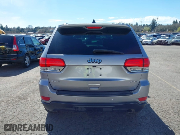 2016 Jeep Grand Cherokee Laredo z VIN 1C4RJFAG7GC392261, wystawiony jako IAAI lot #41890922 z przebiegiem 107 546 mil mil oraz . Historia ofert i sprzedaży dostępna na DreamBid. Obrazek 16.