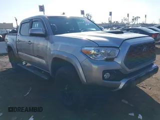 2020 Toyota Tacoma SR5 with VIN 3TMAZ5CN4LM138902, listed as a IAAI auction lot 41453443 with 25,447 mi miles and . Bid and sale history available at DreamBid. Image 1.