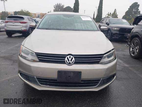 2013 Volkswagen Jetta SE z VIN 3VWDP7AJ4DM265033, wystawiony jako IAAI lot #41029651 z przebiegiem 126 879 mil mil oraz . Historia ofert i sprzedaży dostępna na DreamBid. Obrazek 13.