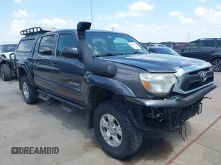 2015 Toyota Tacoma with VIN 5TFLU4EN0FX145357, listed as a IAAI auction lot 42242170 with 152,962 mi miles and . Bid and sale history available at DreamBid. Image 1.