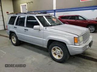 1998 Jeep Grand Cherokee Limited with VIN 1J4GZ78Y3WC216952, listed as a Copart auction lot 83239574 with 186,809 mi miles and Salvage Title. Bid and sale history available at carsss.com. Image 4.