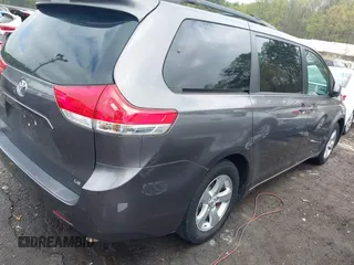 2014 Toyota Sienna LE AAS with VIN 5TDKK3DC3ES506466, listed as a IAAI auction lot 41908023 with 118,297 mi miles and . Bid and sale history available at carsss.com. Image 4.