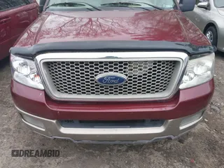 2004 Ford F-150 XLT with VIN 1FTPW12564KD77115, listed as a IAAI auction lot 41929386 with 213,172 mi miles. Bid and sale history available at carsss.com. Image 6.