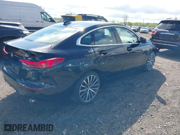 2021 BMW 2 Series 228i xDrive with VIN WBA73AK08M7J51154, listed as a IAAI auction lot 42168185 with 52,167 mi miles and . Bid and sale history available at DreamBid. Image 4.