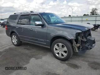 2015 Ford Expedition Platinum with VIN 1FMJU1LT1FEF00504, listed as a Copart auction lot 55325875 with 133,336 mi miles and Salvage title. Bid and sale history available at DreamBid. Image 4.
