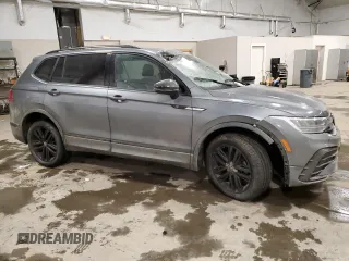 2022 Volkswagen Tiguan SE R-Line Black with VIN 3VV8B7AX3NM095130, listed as a Copart auction lot 88801635 with 49,465 mi miles and Salvage Title. Bid and sale history available at DreamBid. Image 4.
