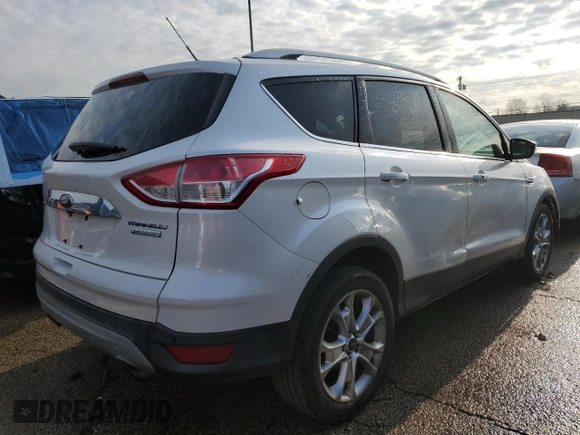 2015 Ford Escape Titanium with VIN 1FMCU0J99FUA16290, listed as a Copart auction lot 52496855 with 107,674 mi miles and Salvage Title. Bid and sale history available at DreamBid. Image 3.