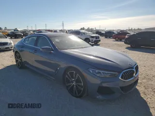 2022 BMW 8 Series M850i с VIN WBAGV8C06NCH25022, выставлен на аукционе Copart как лот 82894104 с пробегом 26 864 миль миль и На запчасти • Non repairable. История ставок и продаж доступна на DreamBid. Изображение 4.