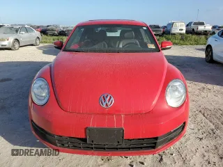 2014 Volkswagen Beetle 2.5L w/Sun with VIN 3VWJP7AT6EM624923, listed as a Copart auction lot 78641794 with 85,000 mi miles and Salvage Title. Bid and sale history available at DreamBid. Image 5.