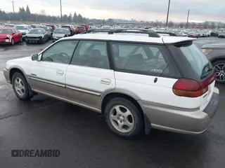 1999 Subaru Legacy Outback z VIN 4S3BG6852X7659898, wystawiony jako IAAI lot #41298823 z przebiegiem 138 834 mil mil oraz . Historia ofert i sprzedaży dostępna na DreamBid. Obrazek 3.