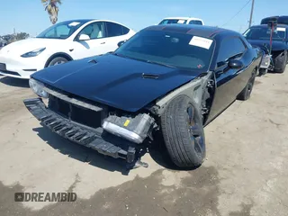 2014 Dodge Challenger R/T with VIN 2C3CDYBT8EH280622, listed as a IAAI auction lot 41973994 with 86,983 mi miles and . Bid and sale history available at DreamBid. Image 2.