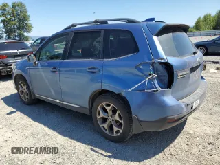 2017 Subaru Forester Touring with VIN JF2SJAWC2HH429099, listed as a Copart auction lot 64671135 with 104,709 mi miles and Salvage title. Bid and sale history available at DreamBid. Image 2.