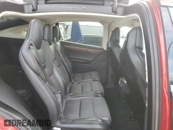2016 Tesla Model X 70D with VIN 5YJXCAE28GF002399, listed as a Copart auction lot 50884225 with 73,113 mi miles and Salvage Title. Bid and sale history available at DreamBid. Image 12.