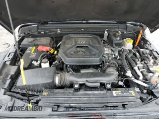 2023 Jeep Wrangler Sahara z VIN 1C4JJXP62PW514489, wystawiony jako Copart lot #51811585 z przebiegiem 39 174 mil mil oraz Szkoda całkowita • Salvage title. Historia ofert i sprzedaży dostępna na DreamBid. Obrazek 12.