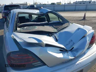 2004 Pontiac Grand Am SE1 with VIN 1G2NF52EX4C256620, listed as a IAAI auction lot 41423079 with 1 mi miles. Bid and sale history available at carsss.com. Image 6.