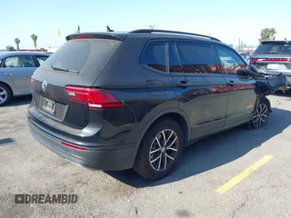 2021 Volkswagen Tiguan S with VIN 3VV1B7AX2MM142289, listed as a IAAI auction lot 42403346 with 71,182 mi miles and . Bid and sale history available at DreamBid. Image 4.