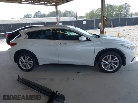 2017 Infiniti QX30 with VIN SJKCH5CP5HA028956, listed as a IAAI auction lot 41833632 with 110,142 mi miles and . Bid and sale history available at DreamBid. Image 13.