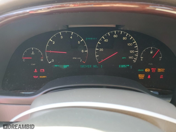 2000 Cadillac DeVille DHS with VIN 1G6KE57Y6YU285006, listed as a Copart auction lot 79158854 with 33,892 mi miles and Non Repairable. Bid and sale history available at carsss.com. Image 9.