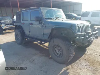 2015 Jeep Wrangler Unlimited Sport with VIN 1C4BJWDG6FL774275, listed as a IAAI auction lot 41984611 with 113,726 mi miles and . Bid and sale history available at DreamBid. Image 1.