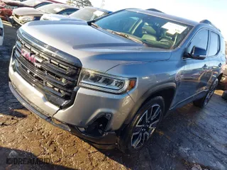 2021 GMC Acadia SLT with VIN 1GKKNMLS6MZ190391, listed as a IAAI auction lot 41353351 with 104,851 mi miles. Bid and sale history available at carsss.com. Image 2.