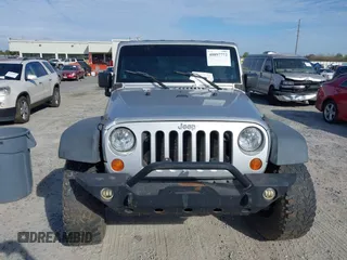 2007 Jeep Wrangler Unlimited X with VIN 1J4GB39147L199367, listed as a IAAI auction lot 40897772 with 229,309 mi miles and . Bid and sale history available at DreamBid. Image 12.