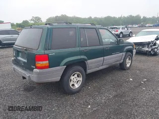 1996 Jeep Grand Cherokee Laredo with VIN 1J4GZ58S6TC333856, listed as a IAAI auction lot 42504895 with 176,955 mi miles and . Bid and sale history available at DreamBid. Image 4.
