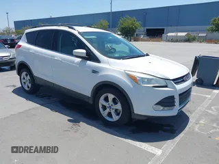 2013 Ford Escape SE with VIN 1FMCU0GX6DUB97349, listed as a IAAI auction lot 42490165 with 102,002 mi miles and . Bid and sale history available at DreamBid. Image 1.