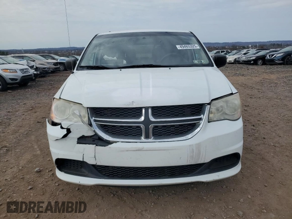 2014 Dodge Grand Caravan SE 30th Anniversary with VIN 2C4RDGBG8ER180968, listed as a Copart auction lot 49465325 with 104,430 mi miles and Salvage Title. Bid and sale history available at DreamBid. Image 5.