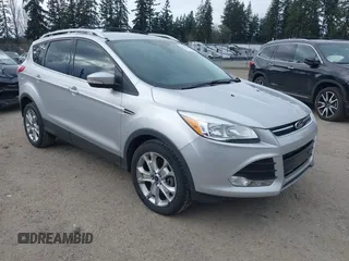 2015 Ford Escape Titanium with VIN 1FMCU9JX2FUB08134, listed as a IAAI auction lot 41839666 with 125,713 mi miles. Bid and sale history available at carsss.com. Image 1.
