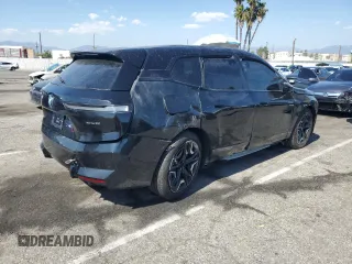 2025 BMW iX xDrive50 z VIN WB523CF02SCS06555, wystawiony jako Copart lot #55291115 z przebiegiem Nie podano mil oraz Szkoda całkowita • Salvage title. Historia ofert i sprzedaży dostępna na DreamBid. Obrazek 3.