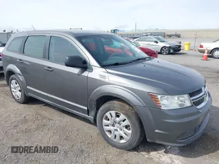 2013 Dodge Journey SE with VIN 3C4PDCAB7DT675440, listed as a IAAI auction lot 41927853 with 263,264 mi miles. Bid and sale history available at carsss.com. Image 1.