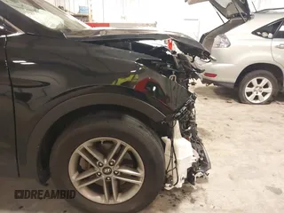 2017 Hyundai Santa Fe 2.4L with VIN 5NMZUDLBXHH041621, listed as a IAAI auction lot 42194586 with 91,012 mi miles and . Bid and sale history available at DreamBid. Image 19.