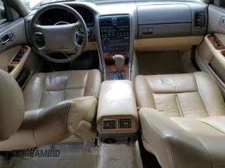 1994 Lexus LS z VIN JT8UF11E7R0195154, wystawiony jako Copart lot #81828264 z przebiegiem 142 045 mil mil oraz Szkody całkowita. Historia ofert i sprzedaży dostępna na DreamBid. Obrazek 8.