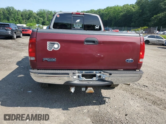 1998 Ford F-150 with VIN 1FTZX18W8WNB76999, listed as a Copart auction lot 59845595 with 135,063 mi miles and Salvage title. Bid and sale history available at DreamBid. Image 6.