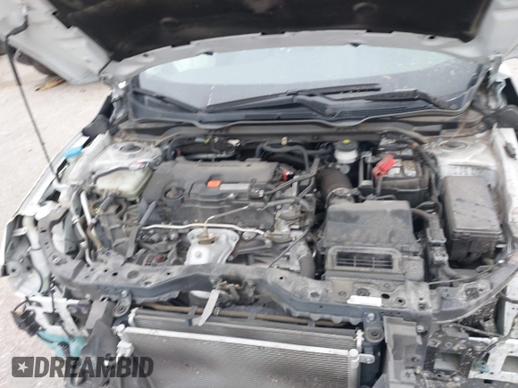 2020 Honda Civic LX with VIN 19XFC2F62LE021811, listed as a IAAI auction lot 41591466 with 75,797 mi miles and . Bid and sale history available at DreamBid. Image 10.