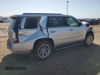 2017 GMC Yukon SLT with VIN 1GKS2BKC9HR345688, listed as a Copart auction lot 52303075 with 122,969 mi miles and Salvage Title. Bid and sale history available at carsss.com. Image 3.