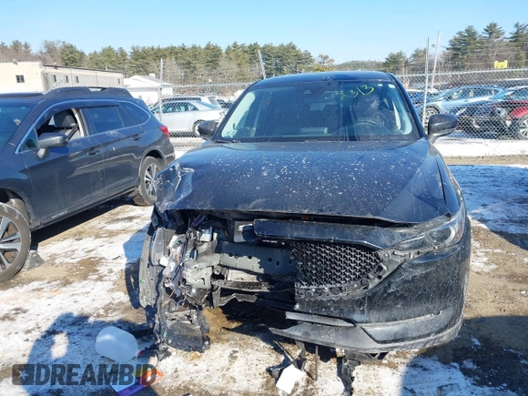 2020 Mazda CX-5 Grand Touring with VIN JM3KFBDM7L1807685, listed as a IAAI auction lot 41392313 with 91,729 mi miles and . Bid and sale history available at carsss.com. Image 12.