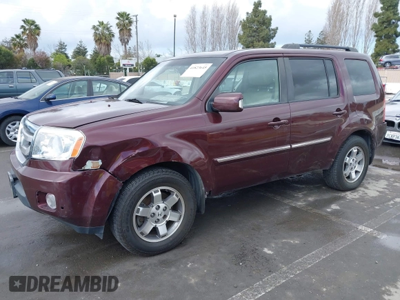 2009 Honda Pilot Touring with VIN 5FNYF48959B007813, listed as a IAAI auction lot 41823645 with 200,571 mi miles and . Bid and sale history available at carsss.com. Image 17.