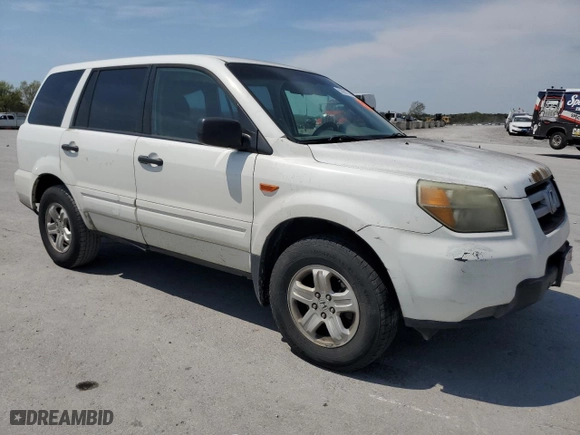 2006 Honda Pilot LX with VIN 5FNYF18126B001343, listed as a Copart auction lot 52601745 with 206,518 mi miles and Salvage Title. Bid and sale history available at carsss.com. Image 4.