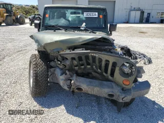 2008 Jeep Wrangler Rubicon z VIN 1J4GA64108L616531, wystawiony jako Copart lot #58363534 z przebiegiem Nie podano mil oraz Szkoda całkowita • Salvage title. Historia ofert i sprzedaży dostępna na DreamBid. Obrazek 5.